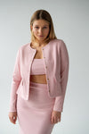 A short jacket with pockets, fastened with golden snaps, made of ribbed cotton "Pink"